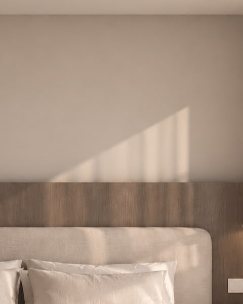 A detail: a wedge of sunlight on a pale wall above dark-oak paneling. Render.